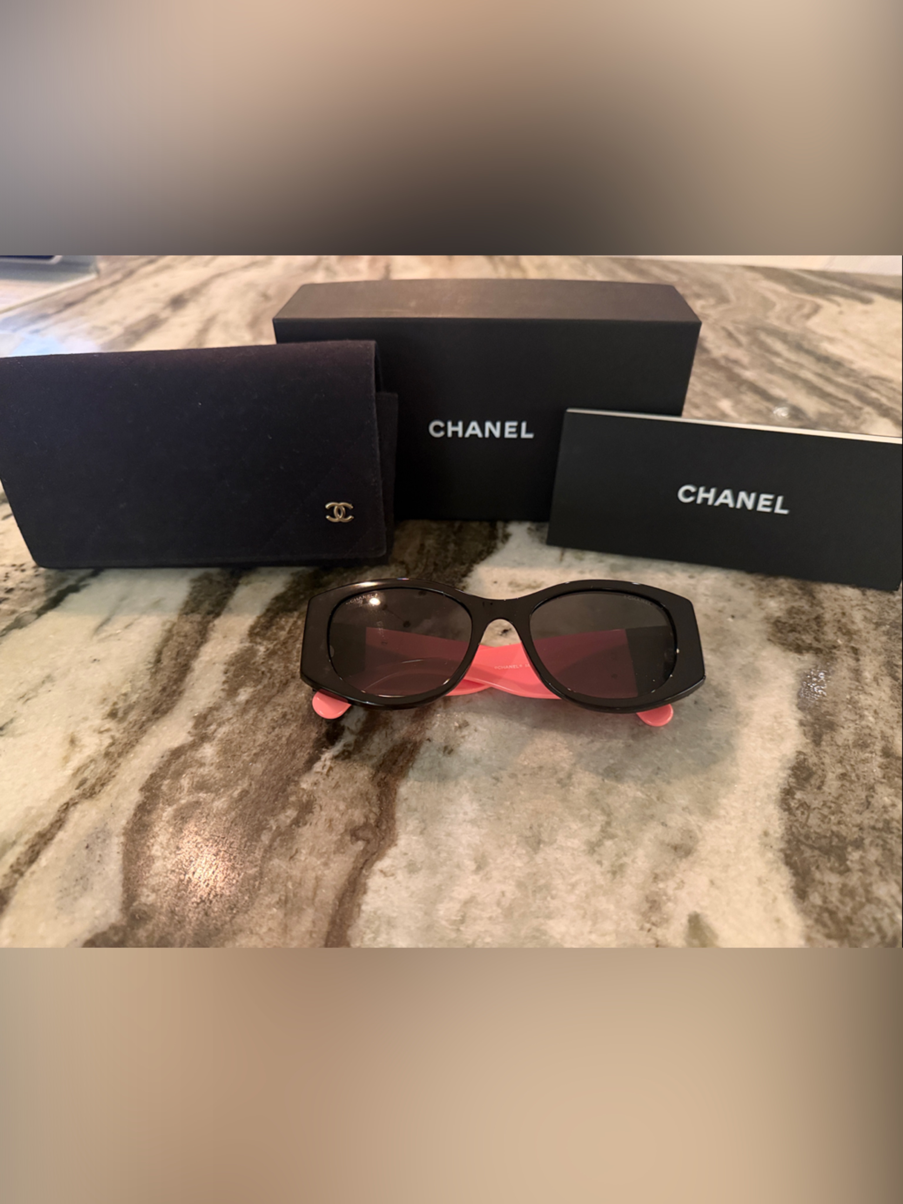 Chanel Black Frame Sunglasses With Pink Temples And Dark Lenses